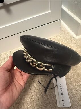 Eugenia Kim Black Leather Baker Boy Cap with Gold Chain